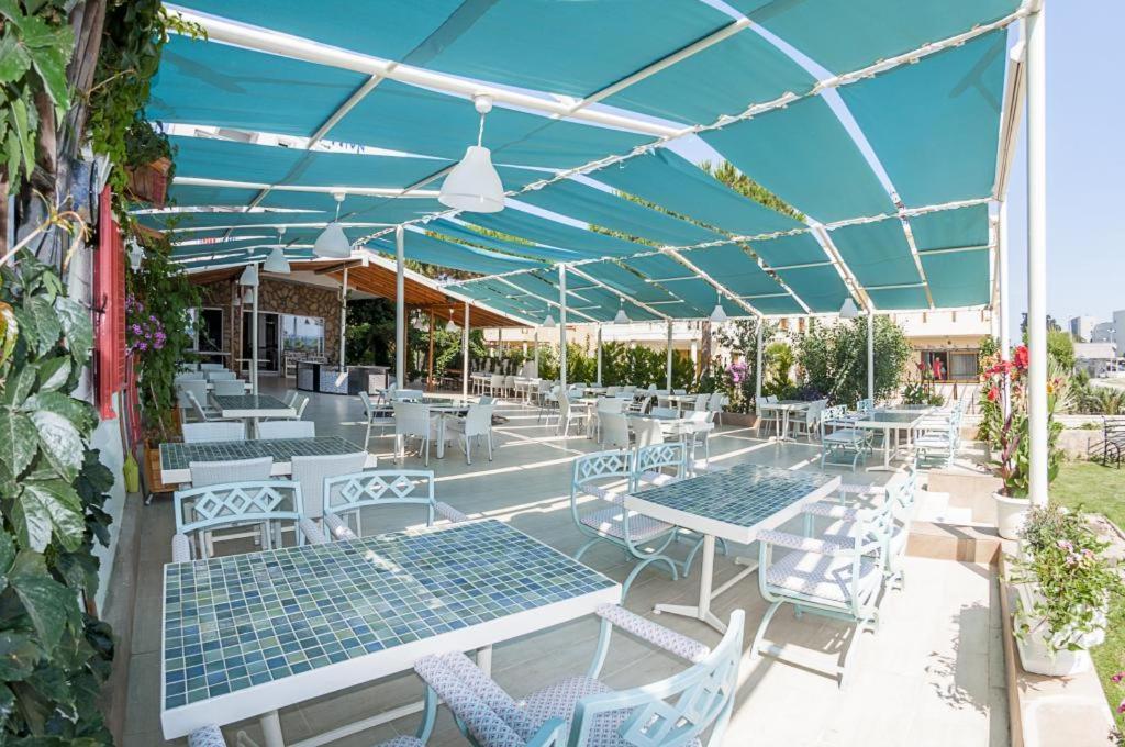 Colophon Beach Otel Гумульдур Экстерьер фото